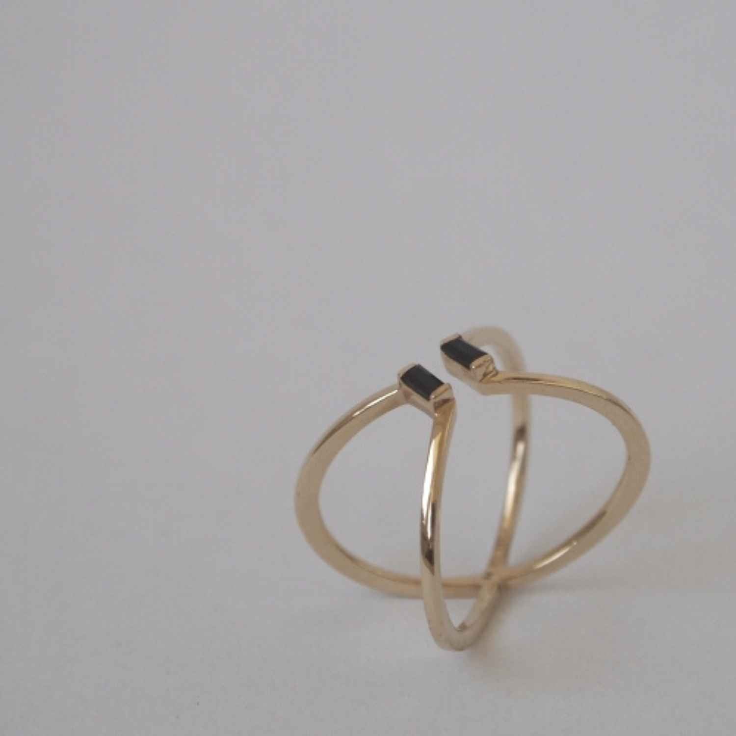 EVELYNE-M BAGUETTE | Black Onyx X - Ring - 18 Karat Gold