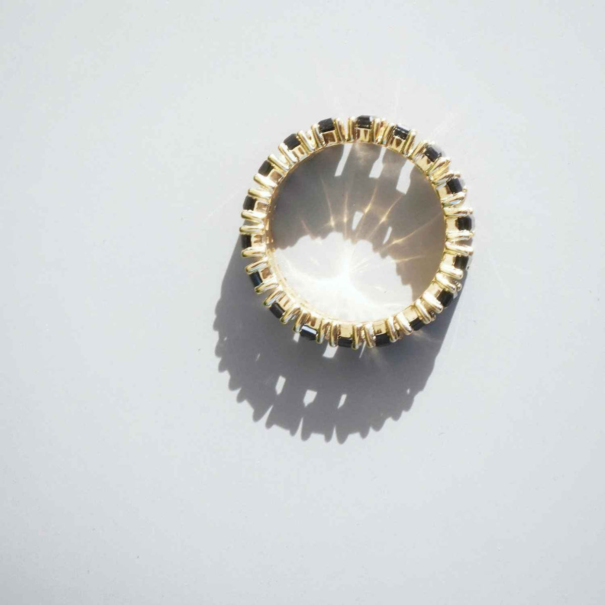 EVELYNE-M BAGUETTE | Black Onyx Carousel - Ring - 18 Karat Gold